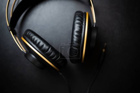 Photo for Professional headphones in flat lay. Dj headset shot directly from above. Listen to the music in high quality - Royalty Free Image