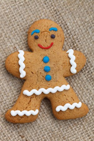 Photo for Gingerbread man cookie baked for holiday. Cute pastry item made at home - Royalty Free Image