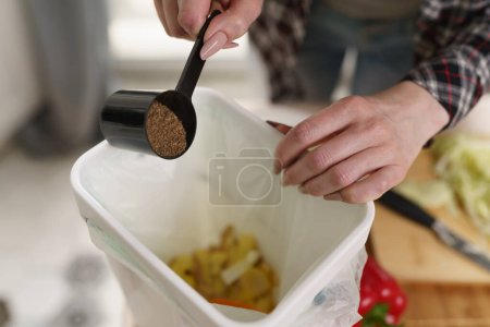 Photo for Female person pouring bokashi ferment in a compost bin. Sustainable lifestyle and zero waste concept - Royalty Free Image