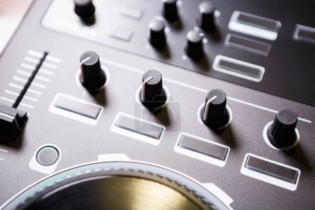 Photo for Dj controller in close up. Professional disc jockey sound mixer with turntable - Royalty Free Image