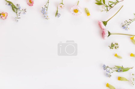 Photo for Festive Pink flowers frame, composition on white background. Overhead top view, flat lay, square. Copy space. Birthday, Mothers, Valentines, Womens, Wedding Day concept - Royalty Free Image