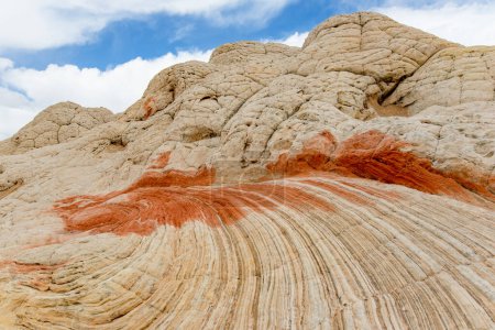 Foto de Mindblowing shapes and colors of moonlike sandstone formations in White Pocket, Arizona, USA. Exploring the American Southwest. - Imagen libre de derechos