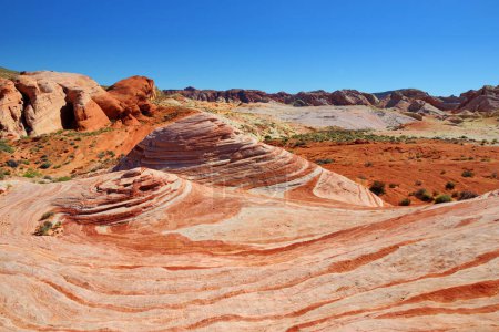 Photo for Beautiful red and white stripes of the Fire Wave sandstone formation in Valley of Fire State Park, Nevada, USA. Exploring the American Southwest. - Royalty Free Image