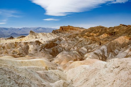 Foto de Stunning view of famous Zabriskie Point in Death Valley National Park, California, USA. Exploring the American Southwest. - Imagen libre de derechos