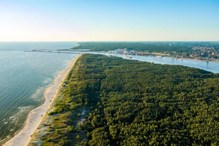 Photo for Aerial view of the Baltic Sea shore line near Klaipeda city, Lithuania. Beautiful sea coast on sunny summer day. - Royalty Free Image