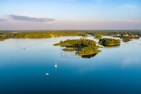 Photo for Beautiful aerial view of lake Galve, favourite lake among water-based tourists, divers and holiday makers, located in Trakai, Lithuania. - Royalty Free Image