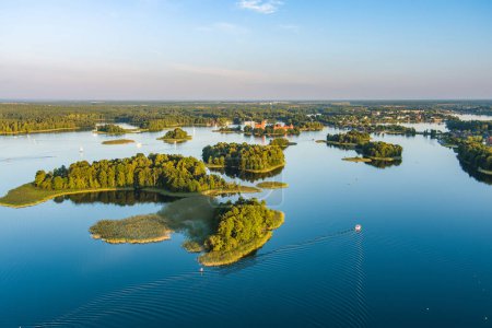 Photo for Beautiful aerial view of lake Galve, favourite lake among water-based tourists, divers and holiday makers, located in Trakai, Lithuania. - Royalty Free Image