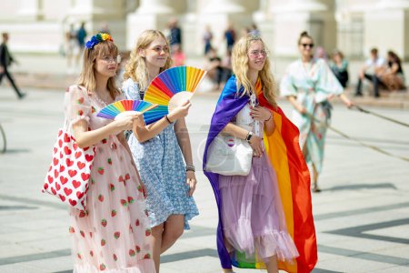 Photo for VILNIUS, LITHUANIA - JULY 1, 2023: Happy cheerful people participating in Vilnius Pride 2023 parade, that took place in Vilnius Old Town. Event celebrating lesbian, gay, bisexual, LGBTI culture pride. - Royalty Free Image