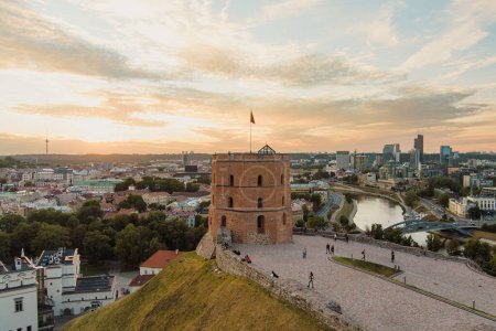 Aerial view of Gediminas Tower, the remaining part of the Upper Castle in Vilnius. Sunset landscape of UNESCO-inscribed Old Town of Vilnius, the heartland of the city, Lithuania.