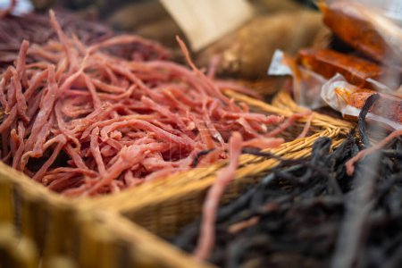 Selection of assorted home made meats, jerky and sausages on a farmers market in Vilnius, Lithuania. Kaziukas, traditional spring fair in capital of Lithuania.