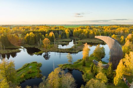 Photo for Amazing aerial view of Kirkilai karst lakes and lookout tower in the bright sunny autumn morning, Birzai eldership, Panevezys county, Lithuania - Royalty Free Image