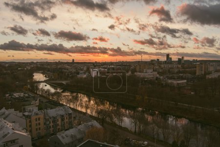 Photo for Beautiful aerial evening view of Vilnius Old Town with scenic sunset illumination. City life in Vilnius city, Lithuania. - Royalty Free Image