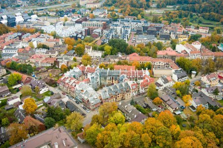 Photo for Beautiful Vilnius city panorama in autumn with orange and yellow foliage. Aerial evening view. Fall city scenery in Vilnius, Lithuania - Royalty Free Image