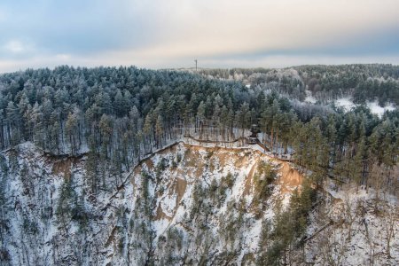 Aerial view of Vilnia river and snow covered geological Puckoriai exposure in Vilnius, the highest exposure in Lithuania. Chilly winter day.