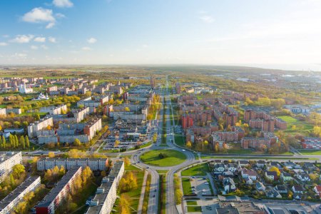 Aerial view of residential area of Klaipeda, Lithuania on sunny evening. Klaipeda city port area and it's surroundings on chilly autumn day.