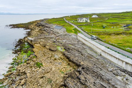 Aerial view of Inishmore or Inis Mor, the largest of the Aran Islands in Galway Bay, Ireland. Famous for its strong Irish culture, loyalty to the Irish language, and a wealth of ancient sites.