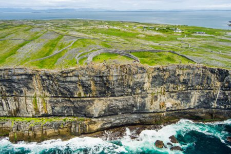 Photo for Aerial view of Dun Aonghasa or Dun Aengus , the largest prehistoric stone fort of the Aran Islands, popular tourist attraction, important archaeological site, Inishmore island, Ireland - Royalty Free Image