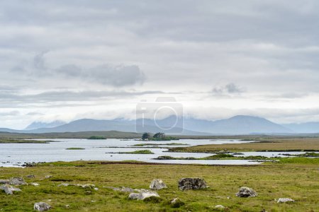 Photo for Beautiful view of Glenicmurrin Lough lake in Connemara region in Ireland. Scenic Irish countryside landscape with magnificent mountains on the horizon, county Galway, Ireland. - Royalty Free Image