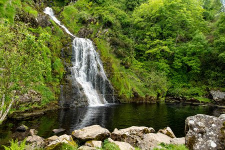 Photo for Aerial view of Assaranca Waterfall, one of Donegal's most beautiful waterfalls. Hidden gem that must-see for tourists visiting the region. Stunning natural attraction near Maghera Beach and Caves. - Royalty Free Image