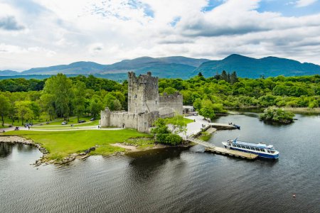 Photo for Aerial view of Ross Castle, 15th-century tower house and keep on the edge of Lough Leane, in Killarney National Park, County Kerry, Ireland. - Royalty Free Image