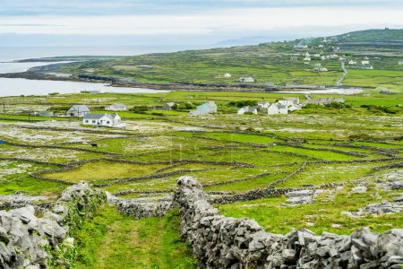 Photo for Inishmore or Inis Mor, the largest of the Aran Islands in Galway Bay, Ireland. Famous for its strong Irish culture, loyalty to the Irish language, and a wealth of ancient sites. - Royalty Free Image