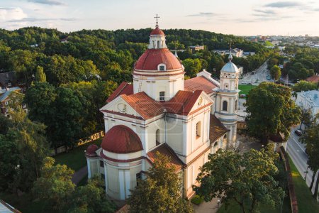 Photo for Aerial view of the Church of St. Peter and St. Paul, located in Antakalnis district in Vilnius. Beautiful summer day in the capital of Lithuania. Summer city scenery in Vilnius, Lithuania. - Royalty Free Image