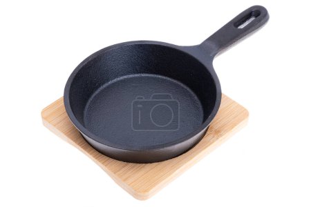 cast iron pan isolated on white background-stock-photo