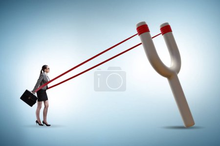 Photo for Businesswoman being launched from slingshot in the career concept - Royalty Free Image