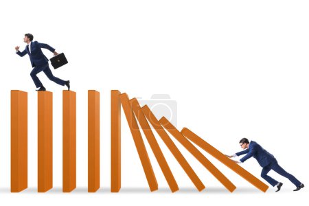Photo for Businessman in the domino effect concept - Royalty Free Image
