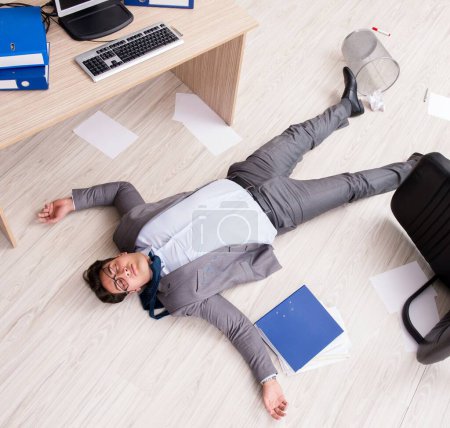 The businessman dead on the office floor