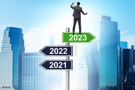 Photo for Businessman on the signpost from 2022 to 2023 - Royalty Free Image