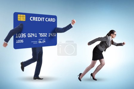 Téléchargez les photos : Les gens d'affaires dans le concept de dette par carte de crédit - en image libre de droit