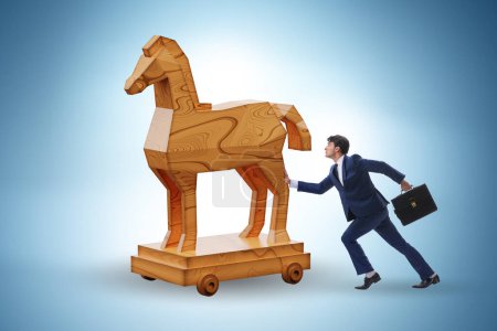 Photo for Businessman and trojan horse in the trap concept - Royalty Free Image