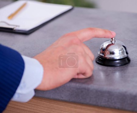 Photo for Young businessman at hotel reception - Royalty Free Image