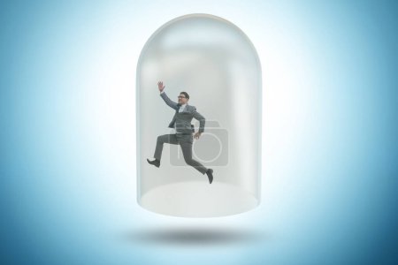 Photo for Businessman trapped in the transparent glass - Royalty Free Image