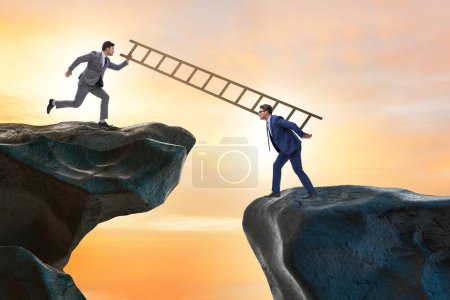 Photo for Business people helping to go over the chasm - Royalty Free Image
