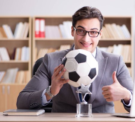 Photo for The businessman with football ball in office - Royalty Free Image