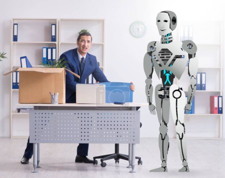 Foto de El concepto de robots reemplazando a los humanos en las oficinas - Imagen libre de derechos