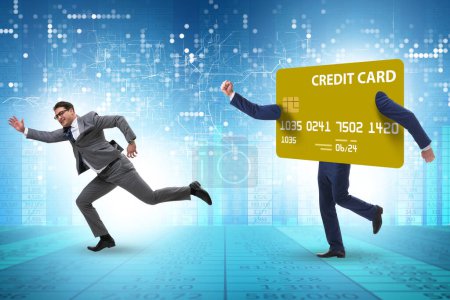 Businessman in credit card debt concept