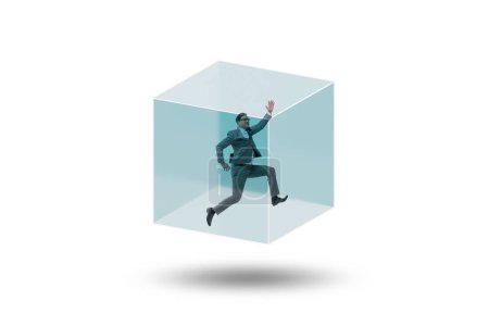 Photo for Businessman trapped in the transparent glass cube - Royalty Free Image