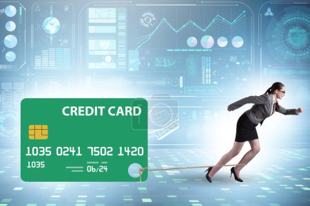 Foto de Empresaria en concepto de deuda con tarjeta de crédito - Imagen libre de derechos
