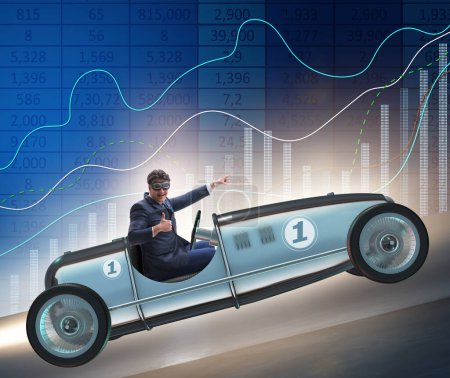 Photo for The businessman riding sports car against charts - Royalty Free Image