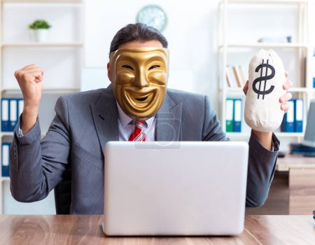 Photo for The businessman wearing mask in hypocrisy concept - Royalty Free Image