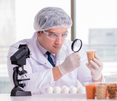 Photo for The nutrition expert testing food products in lab - Royalty Free Image