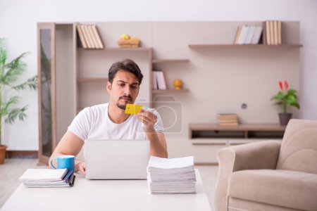 Photo for Young freelancer working from home - Royalty Free Image
