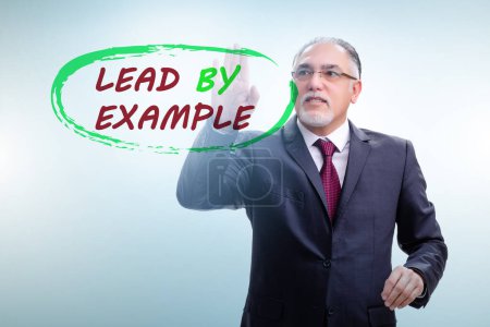 Photo for Businessman in the lead by example concept - Royalty Free Image