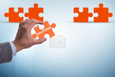 Téléchargez les photos : Business solution concept with the jigsaw puzzle pieces - en image libre de droit