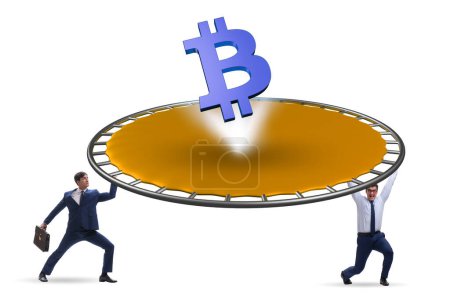 Foto de Monetary concept with cryptocurrency bouncing off trampoline - Imagen libre de derechos