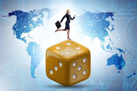 Téléchargez les photos : Businesswoman in uncertainty concept with the dice - en image libre de droit