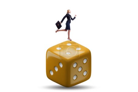 Foto de Businesswoman in uncertainty concept with the dice - Imagen libre de derechos